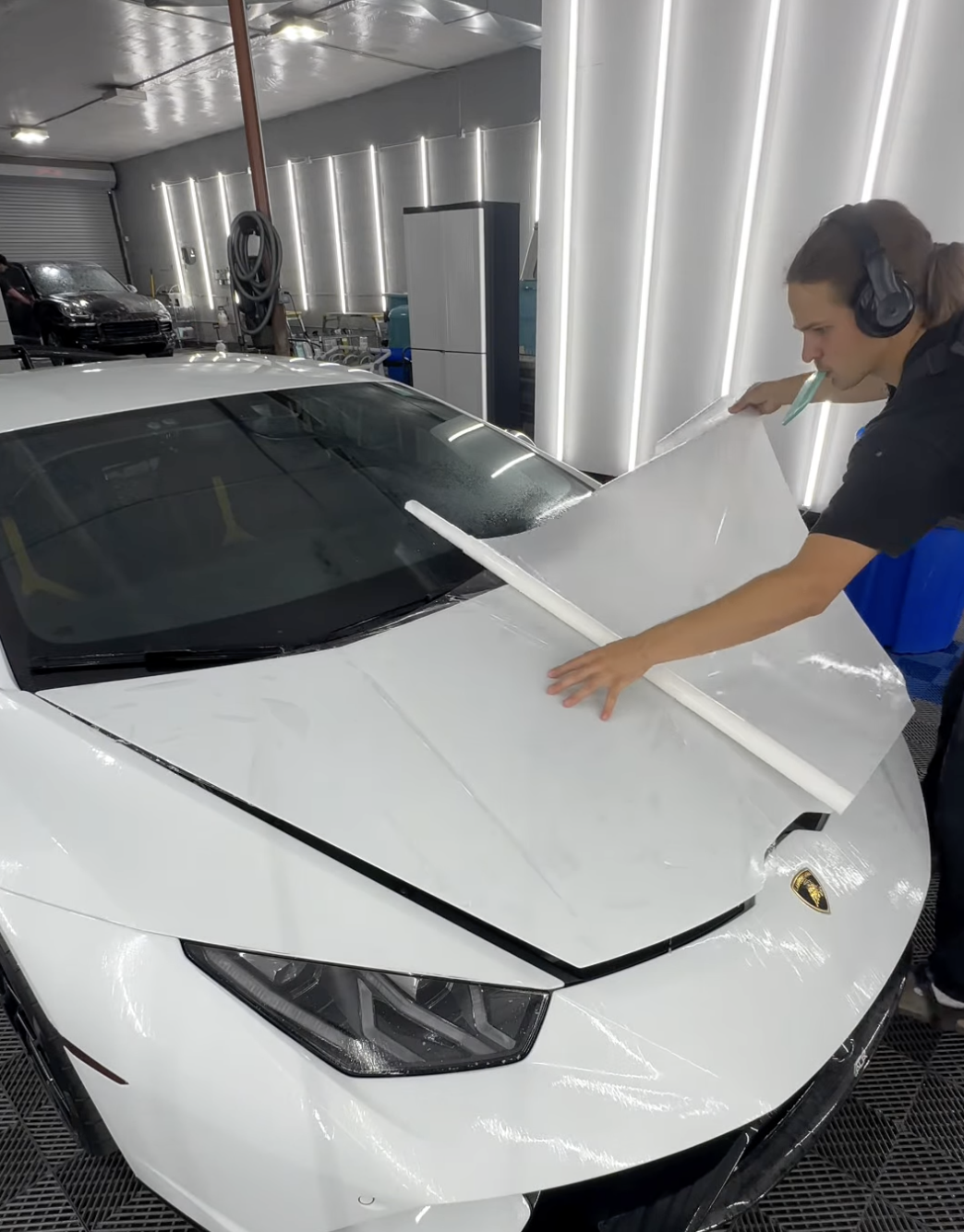 Paint protection film installation on luxury vehicle